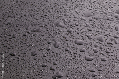 Water drops on a black film background.