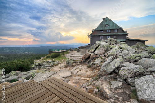 Fototapeta Naklejka Na Ścianę i Meble -  Szrenica mountain shelter (1362 m above sea level) during sunset, Szklarska Poreba, Poland, Europe.