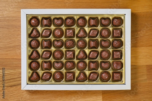 Box of chocolate bonbon candieson a table