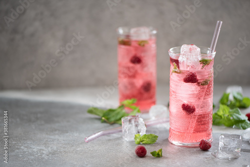 cold lemonade with fresh raspberries and mint