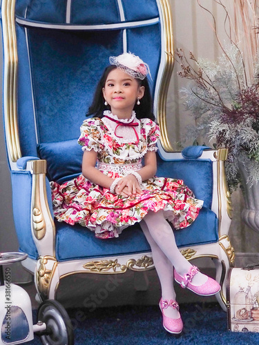 beautiful girl wearing Thai a floral retro dress. 