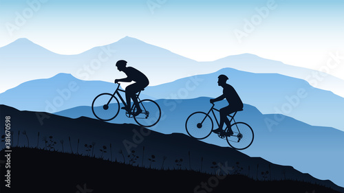 Silhouette of cyclists on the mountain