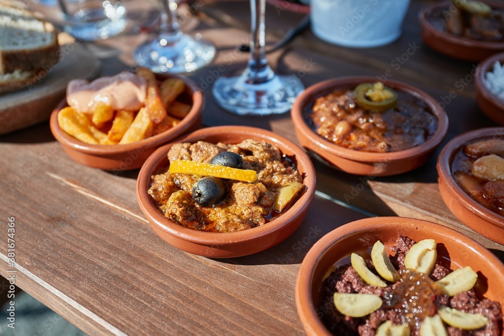 Tapas served at a restaurant with a variety of small plates