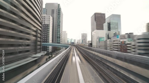 4K Timelapse Sequence of Tokyo, Japan - Hyperlapse POV timelapse through Tokyo via the automated guideway transit called Yurikamome during the day photo