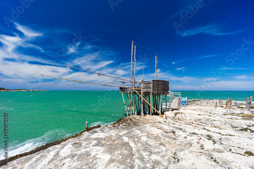 Schilderij op canvas fishing towers near Vieste, NP Gargano, Foggia, Italy