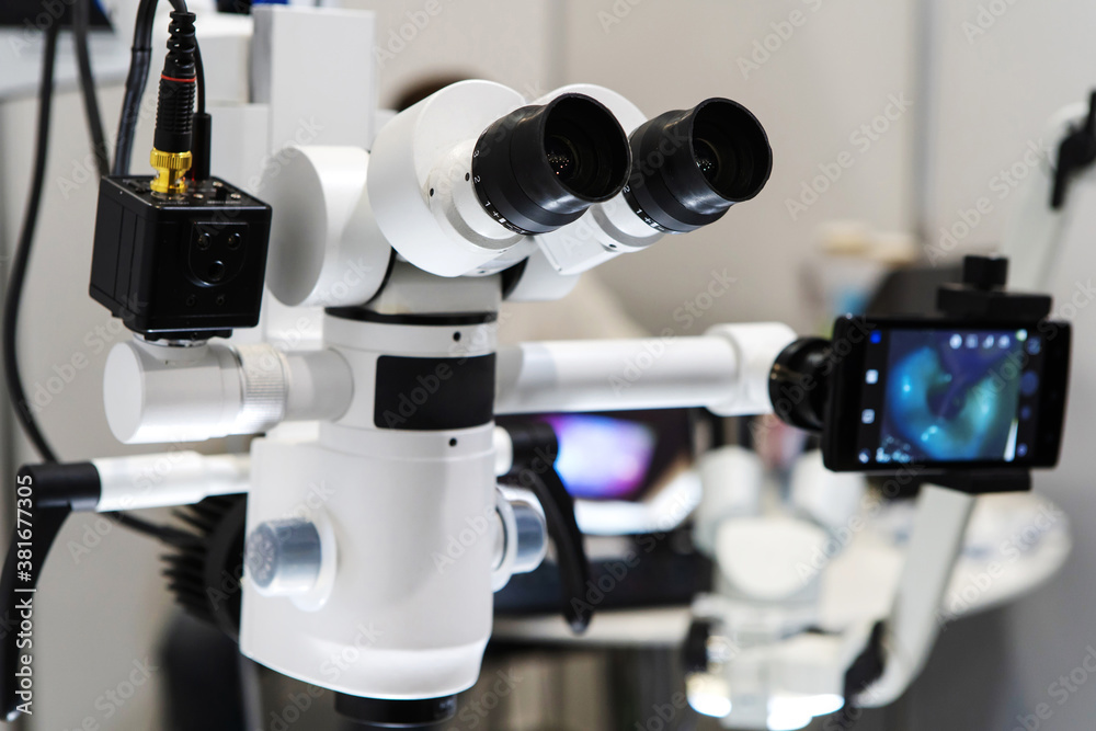 A fragment of an electron microscope for medical research. Modern medical equipment in action A fragment of an electron microscope for medical research. Modern medical equipment in action