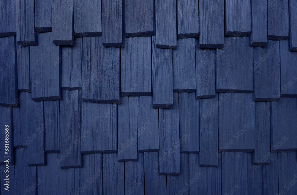 Rough bumpy wood shingle cladding Rough bumpy wood shingle cladding