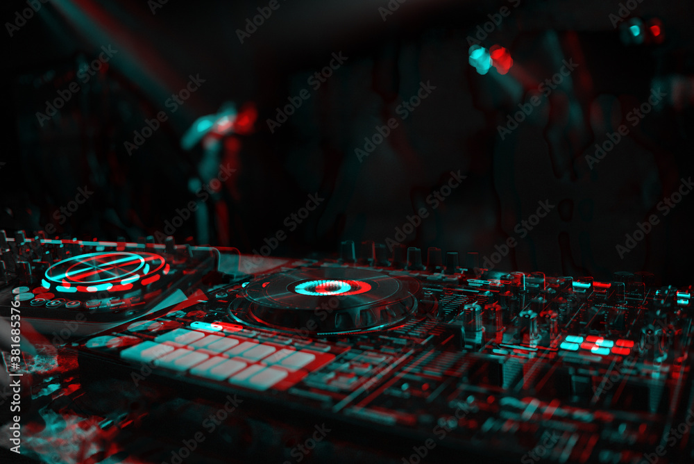 DJ console for mixing music with blurry people dancing at a nightclub  party. Black and white with 3D glitch virtual reality effect Photos | Adobe  Stock