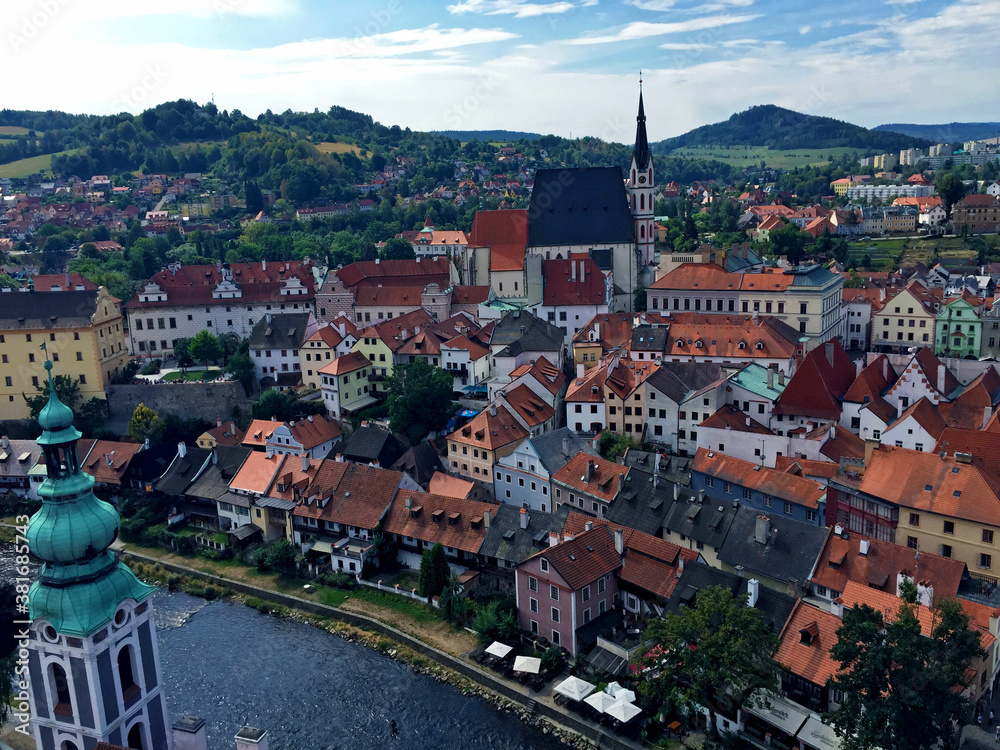 view of the town of cesky krumlov from a hill, in Czech Republic