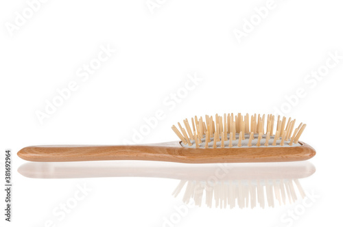 Wooden hair brush close up  on white background