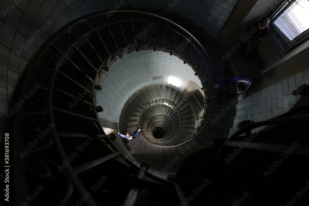 Fototapeta premium Le Phare d’Eckmühl. Situé à la pointe de Penmarc’h, escalier intérieur