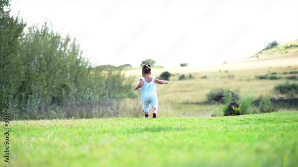 Small South African girl running away from camera Small South African girl running away from camera