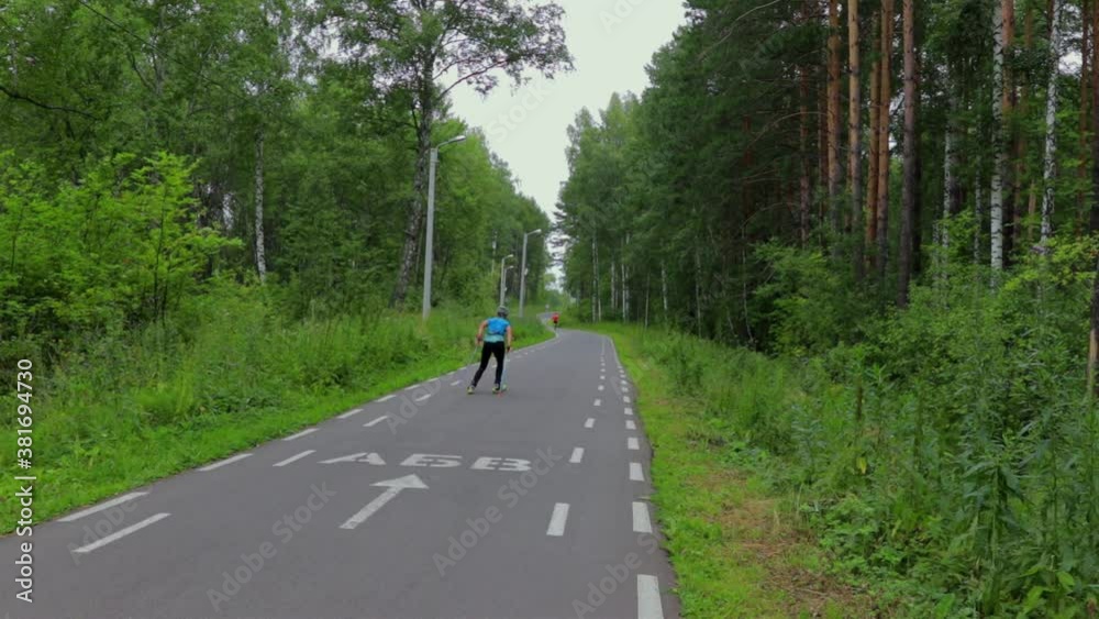 people rollerblading in the park. Lead a healthy lifestyle people rollerblading in the park. Lead a healthy lifestyle