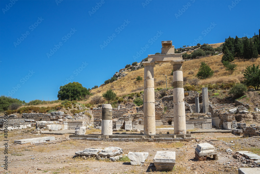 Ruins in the ancient Greek city Ephesus or Efes on the coast of Ionia in Izmir Province, Turkey in summer day.