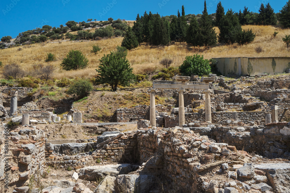 Ruins in the ancient Greek city Ephesus or Efes on the coast of Ionia in Izmir Province, Turkey in summer day