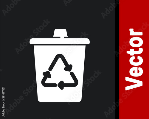 White Recycle bin with recycle symbol icon isolated on black background. Trash can icon. Garbage bin sign. Recycle basket sign. Vector.