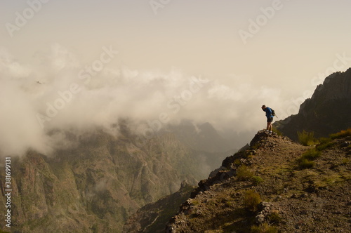 Hiking on the mountain ridge of Madeira Island on the way to Pico Ruivo, Portugal