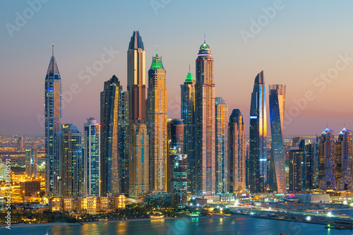 Dubai Marina skyscrapers and Jumeirah beach at sunrise  United Arab Emirates