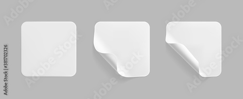 White square glued stickers with curled corners mock up set. Blank white adhesive square paper or plastic sticker label with wrinkled, crumpled effect. Blank template label tags. 3d realistic vector