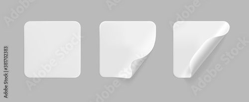 White square glued stickers with curled corners mock up set. Blank white adhesive square paper or plastic sticker label with wrinkled, crumpled effect. Blank template label tags. 3d realistic vector