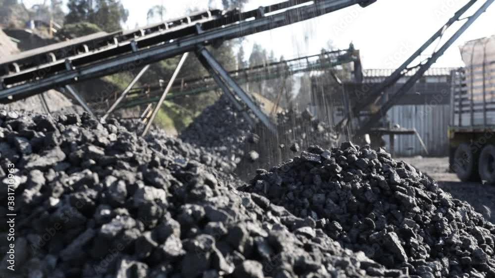 Coal falling from conveyor belt to the ground Coal falling from conveyor belt to the ground