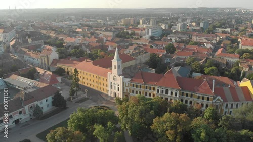 Aerial / drone footage of Pécs, the fifth largest city of Hungary, a major cultural center of Hungary, on the slopes of the Mecsek mountains, administrative and economic center of Baranya County photo