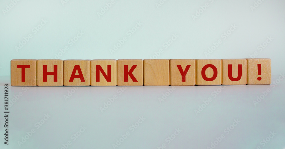 Wooden cubes with the inscription 'thank you'. Beautiful white background, copy space. Concept. Wooden cubes with the inscription 'thank you'. Beautiful white background, copy space. Concept.