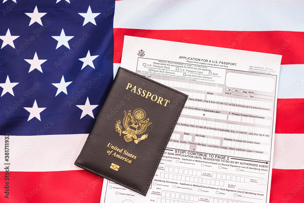 Fototapeta premium American passport on flag.