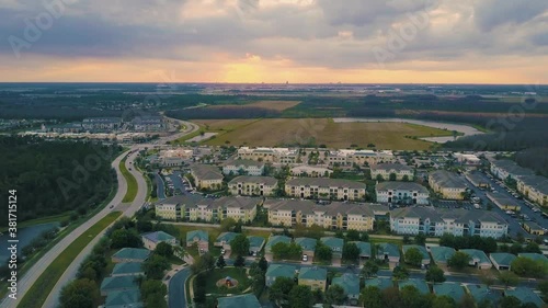 Flying over Lake Nona in Orlando Florida with sunset in the background. photo