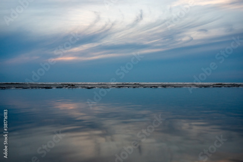 An Abstract Shot of the Sky Mirrored in a Pool of Water