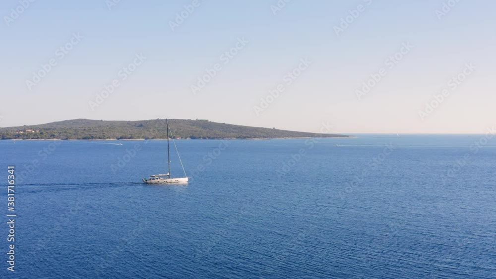 Aerial view of sailboat in a summer day in the mediterranean coast of Croatia. Aerial view of sailboat in a summer day in the mediterranean coast of Croatia.