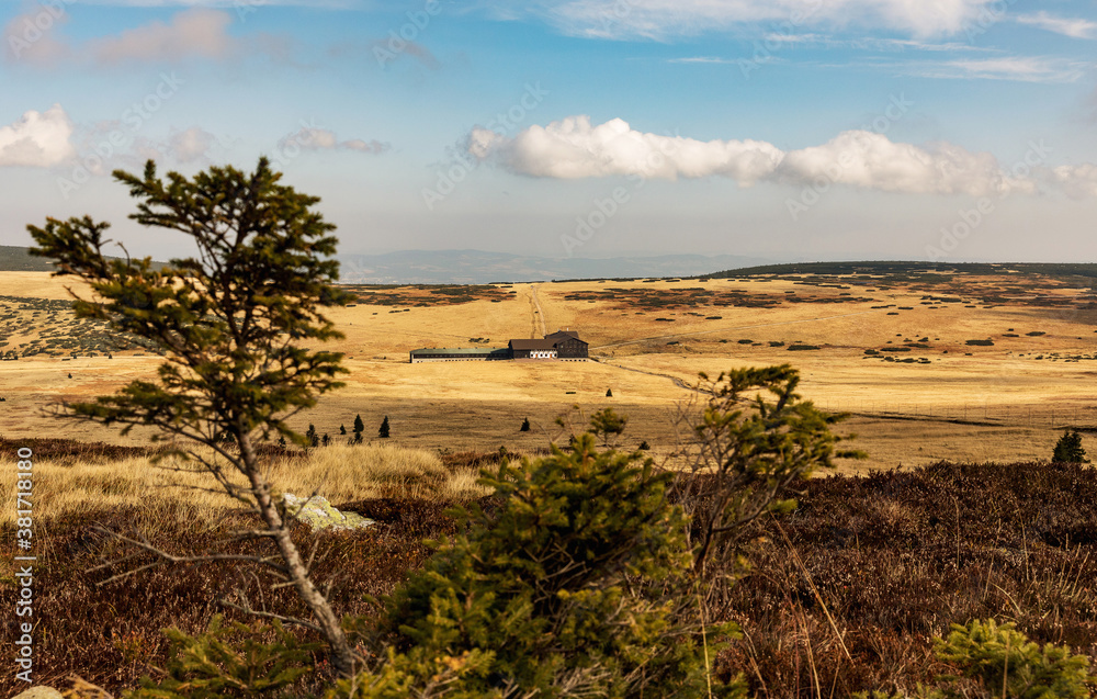 View of the mountain hut Lucni Bouda on sunny autumn day in Giant Mountains, Krkonose National Park, Czech Republic.