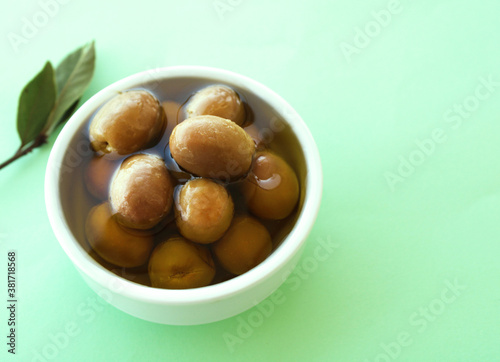 bowl of olives with olive oil