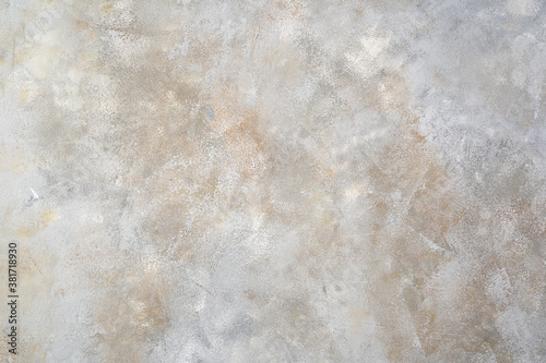 Horizontal Gray concrete background with white and beige hues. Concept for your design.