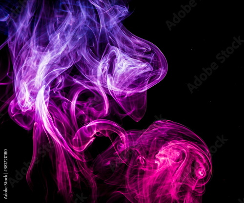 Colored smoke on black background