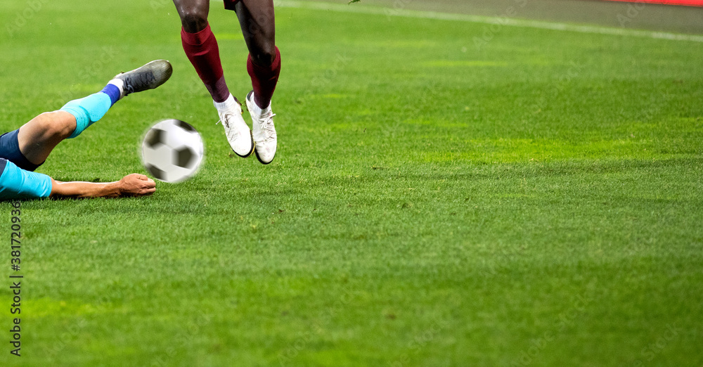 Obraz premium banner of soccer game players fighting for football