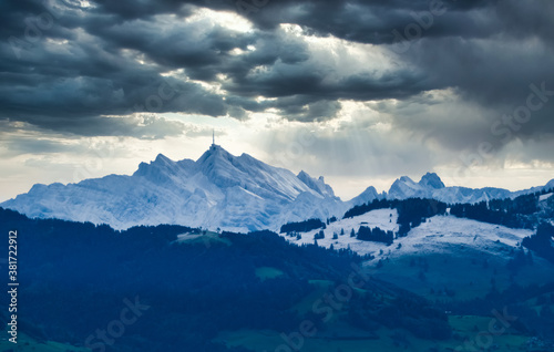 Distant view of the snow covered Santis peak, the highest mountain in the Alpstein massif of northeastern Switzerland © Luis