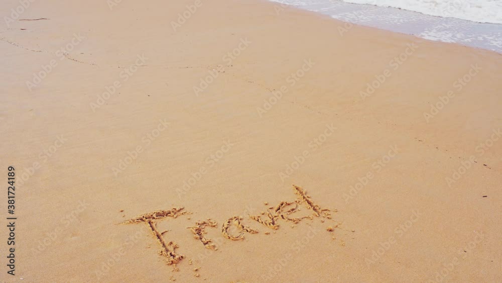 Text Travel on the sea beach and splashing waves on the sand with the slow motion wave in nature concept Text Travel on the sea beach and splashing waves on the sand with the slow motion wave in nature concept
