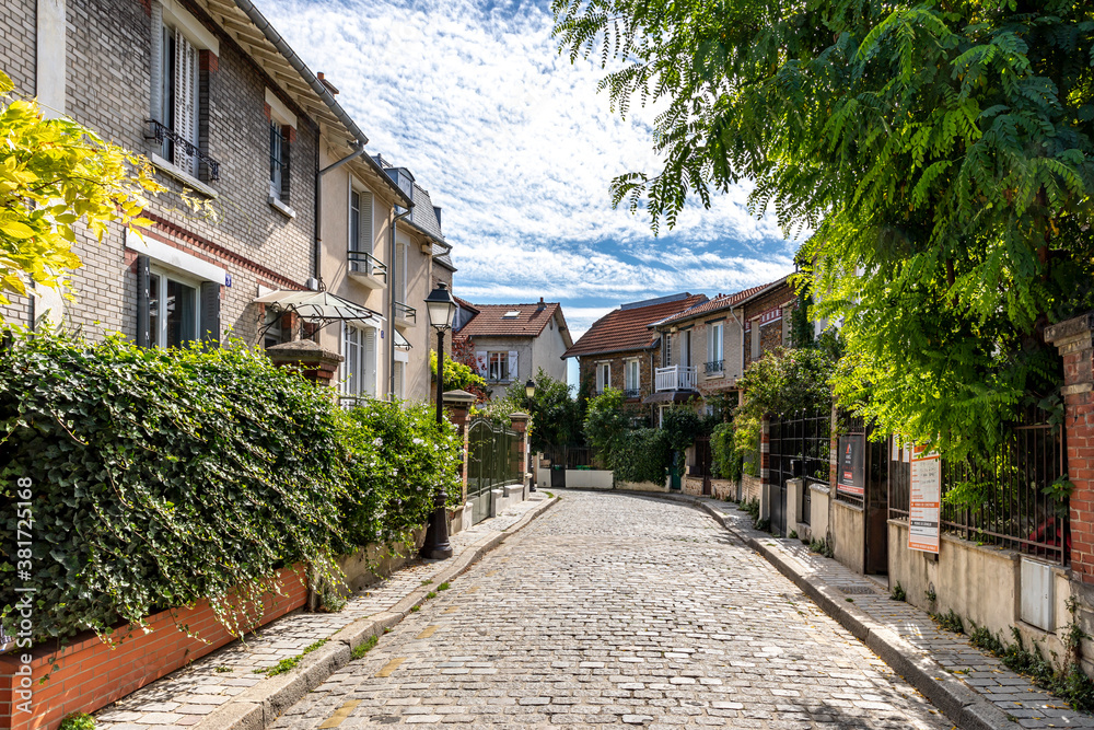 Paris, France - September 9, 2020: Beautiful old house, like in the countryside, in the center of Paris, in the area called Paris, France - September 9, 2020: Beautiful old house, like in the countryside, in the center of Paris, in the area called