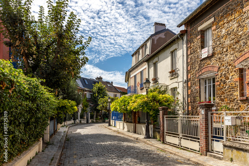 Paris, France - September 9, 2020: Beautiful old house, like in the countryside, in the center of Paris, in the area called 