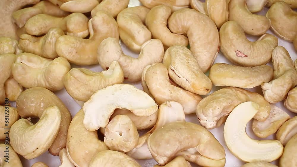 Cashew Nuts Texture Closeup Video Seamless Looping Cashew Nuts Texture Closeup Video Seamless Looping