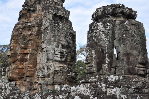 Giant stone faces at Bayon Temple in Angkor Wat, the massive Khmer religious complex in Siem Reap, Cambodia © Jen