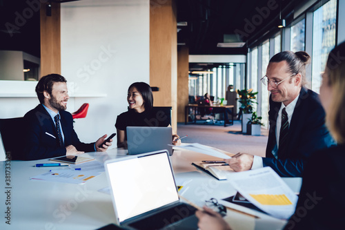 Modern diverse business people in open space conference room