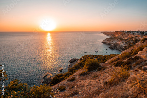 Sunset on Cape Fiolent  panorama of the black sea with azure water  Crimea
