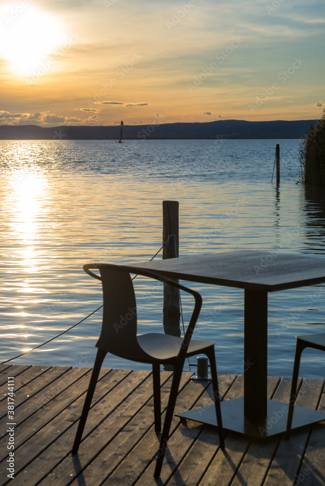 Table and seats on the lakeside of lake Neusiedlersee