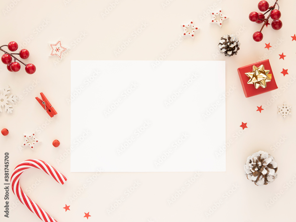 Christmas flat lay mockup letter blank paper sheet with Xmas decorations on white background Christmas flat lay mockup letter blank paper sheet with Xmas decorations on white background