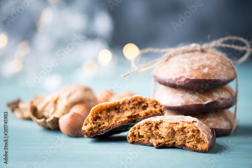 Nuremberg gingerbread with nuts on a blue and grey background, empty space for test, traditional german sweetness for christmas kown as Lebkuchen photo