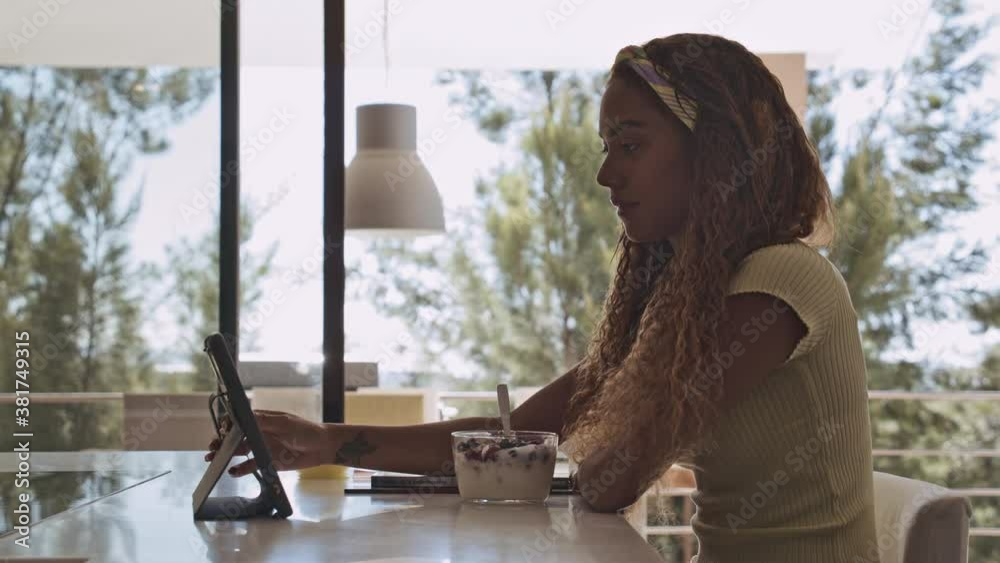 Female Student and the New Normal in Studying with Tablet in Front of Her Female Student and the New Normal in Studying with Tablet in Front of Her