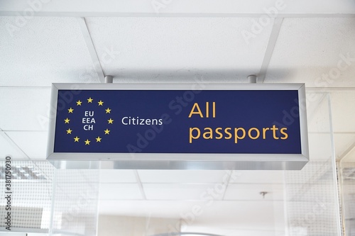 Signs for the border control at an international airport terminal