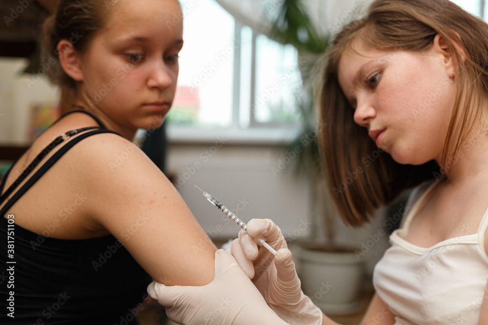Injection of insulin in arm. Treating Diabetes. Injection of insulin in arm. Treating Diabetes.